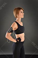 Crossfit woman in black outfit standing