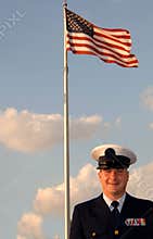 Military man and flag