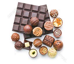 Various chocolate pralines and chocolate bar