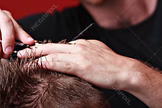 Barber cutting hair