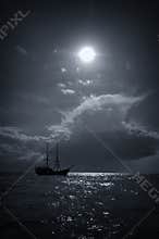 Viking ship and sun at sea