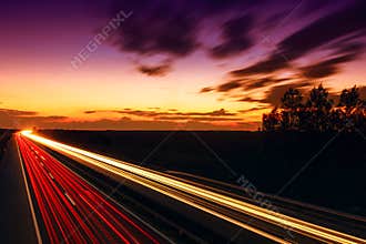 Cars speeding on a highway