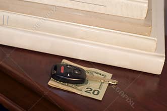 Car key on $20 bill