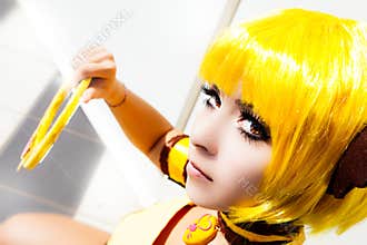 Yellow hair. Cosplay girl, costume cartoon Japanese manga.