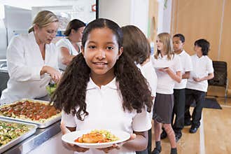 Schoolgirl in a school cafeteria