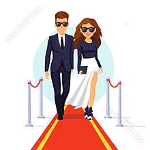 Two rich celebrities walking on a red carpet
