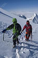 mountaineers in alps mountains