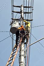 Electrical worker repairing the installation