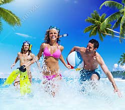 People Playing at a Tropical Beach Enjoyment Concept