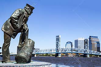 Jacksonville, Florida skyline and sailor sculpture