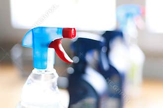 Spray bottle of disinfectant household cleaners.