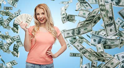 Happy young woman with usa dollar cash money