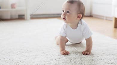 Happy little baby crawling in living room at home 8