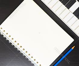 Blank Binding book with Midi Keyboard for music writing.