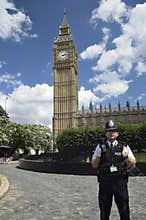 Police man in front of the Big Ben