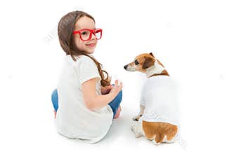 Back Turned Girl and dog sitting down.