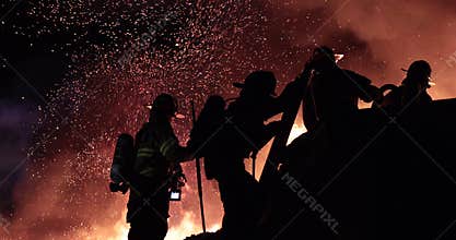 Huge fire blazing in commercial building.