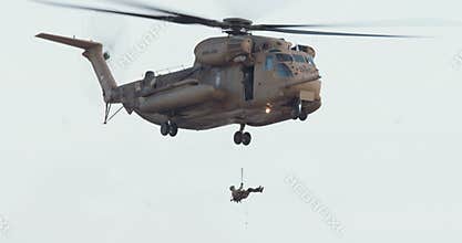 Footage of a military helicopter on a rescue mission