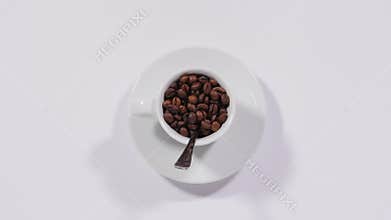 Coffee beans in cup