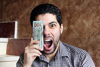 Happy arab businessman with money