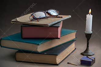 Candlelight and books