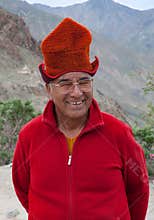 Elderly man buddhist monk wearing Tibetian hat Kasa, Ladakh, North India