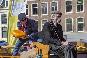 Traditional Gouda cheese farmer in the cheese market