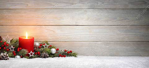 Christmas or Advent wood background with a candle