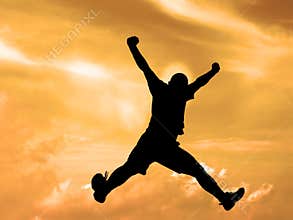 Jumping silhouette sunset sky-clipping path