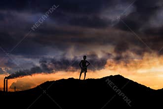 Boy standing on a mountain