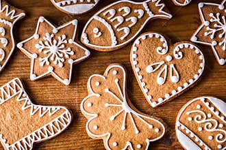 Christmas sweet cakes. Christmas homemade gingerbread cookies on wooden table