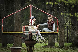 Children`s joy on the carousel.
