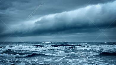 Stormy Rough Sea. Dramatic Dark Sky Cloudscape.