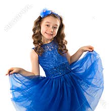 Portrait of a cute little girl in blue princess dress, on white background