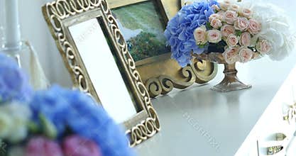 Home decor with photo frames and flowers