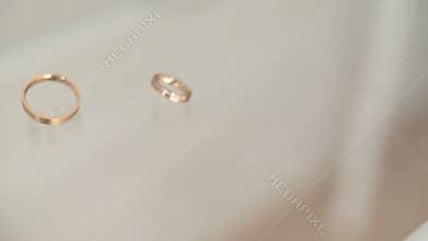 Wedding rings rolling