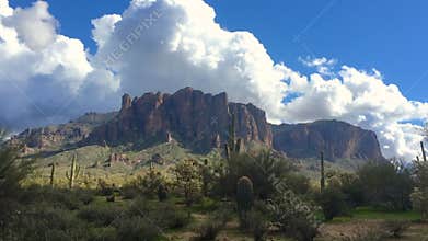 Arizona desert landscape with fluffy white clouds