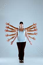 Group of men and women dancing hip hop choreography