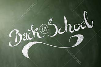 Back to school handwritten on chalkboard