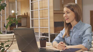 Woman has a video chat at the working hub
