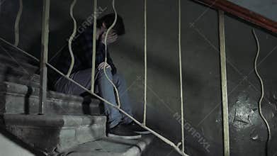 Drug abuse concept., overdose asian male drug addict hand, drugs narcotic syringe in action in old bad building, alcohol