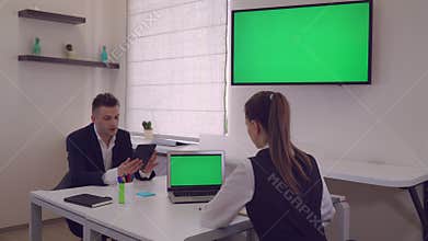 Business people focused at work in contemporary office