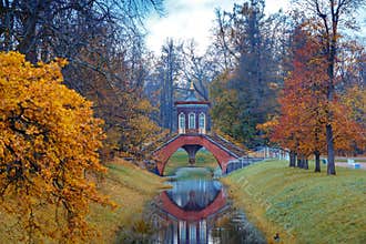 Autumn landscape with a Cross bridge.