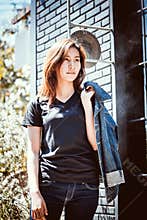 Asia youth teenage girl absurd posing on wall background.