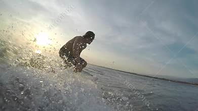 Amateur surfer on the wave