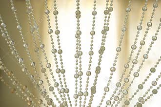 Curtains pearls decoration and backlit background