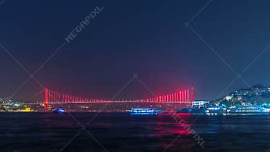 Illuminated bridge over Bosphorus night timelapse. Turkey renames Bosporus Bridge `15th July Martyrs Bridge`. Istanbul