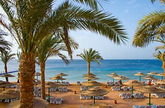 Sand beach of tropical hotel