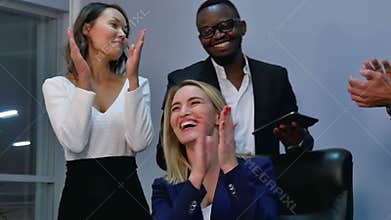 Group of business people giving an applause in the meeting