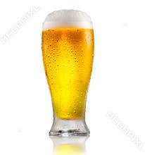 Beer. Glass of cold beer with water drops. Craft beer isolated on white